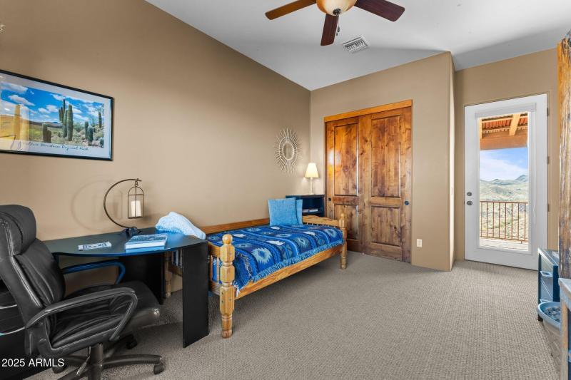 Bedroom four, entrance to deck