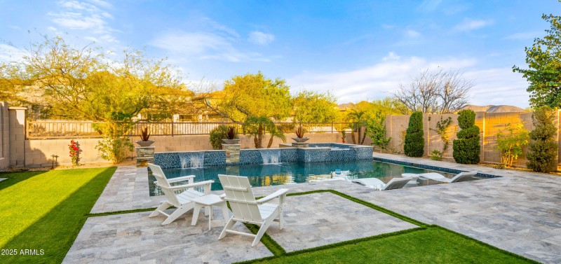 Sparkling Pool with greenbelt behind