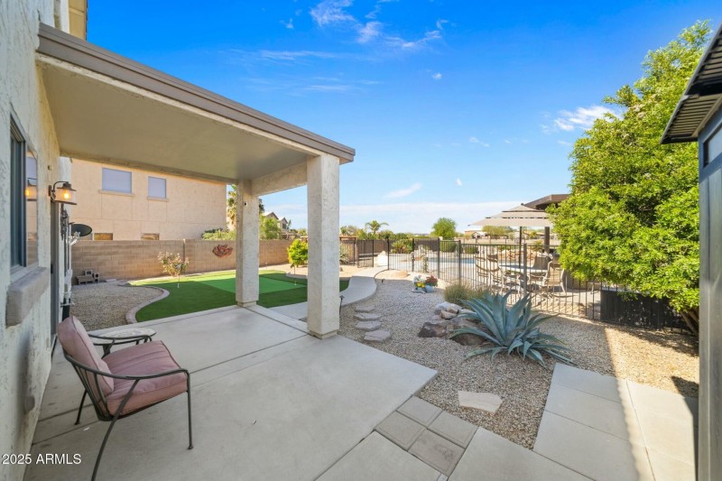 BACK PATIO NEXT TO PUTTING GREEN