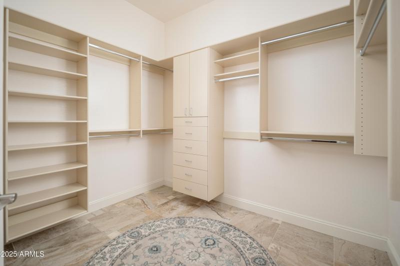 22_Primary Suite Walk-in Closet