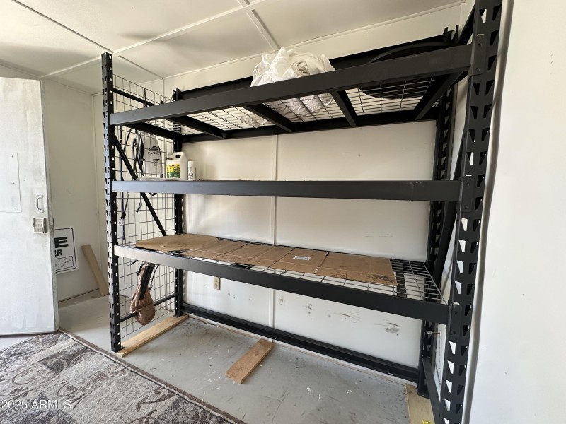 Shed interior wth shelving (2)