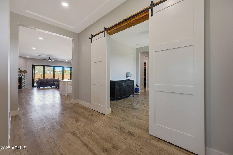 Barn doors into office:formal dining roo