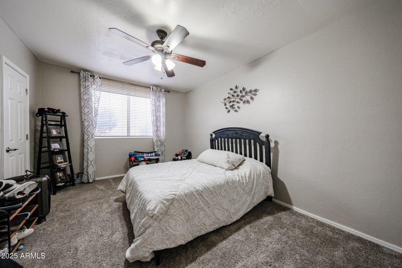 Bedroom 3 downstairs with walk in closet