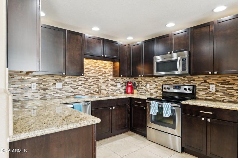 8-web-or-mls-9555-e-raintree-dr-unit-206