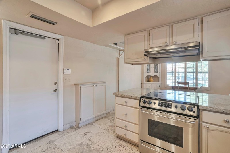 Travertine floors throughout