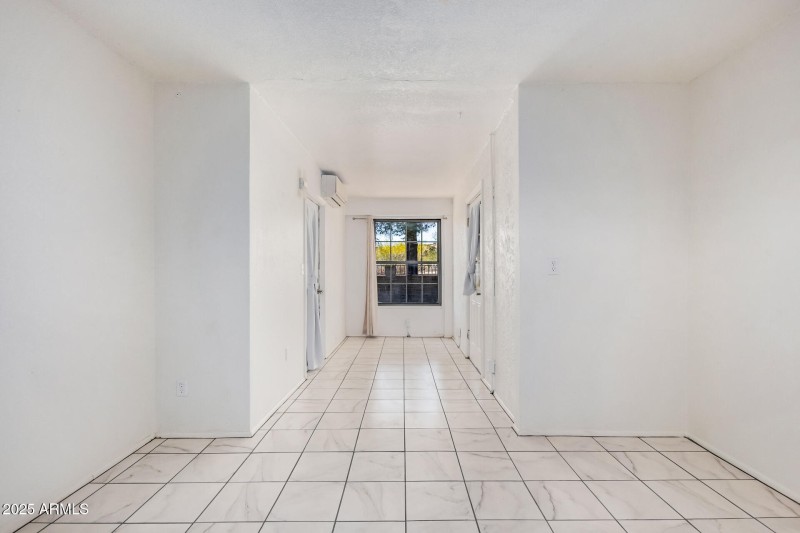 Bright Walkway With Backyard View