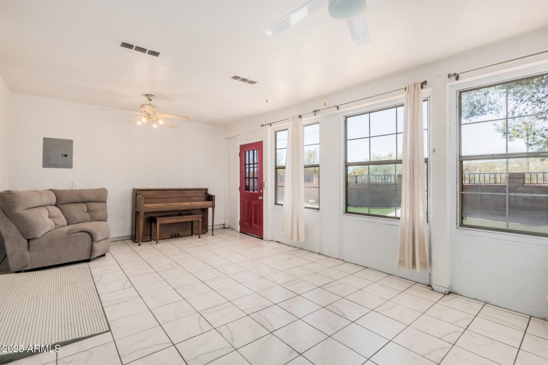 Sunroom With Red Door Access