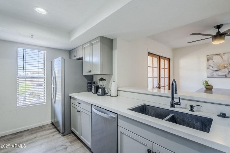 KITCHEN OVERLOOKS FAMILY ROOM