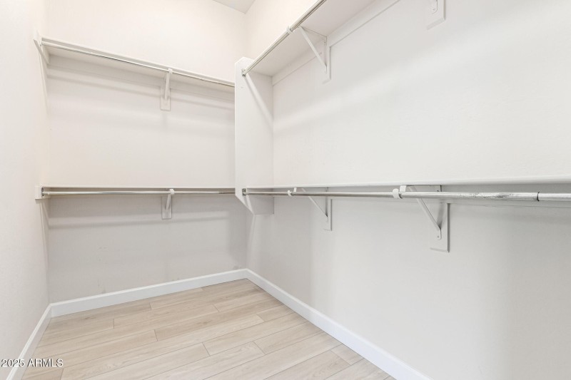 Primary Bedroom Walk in Closet