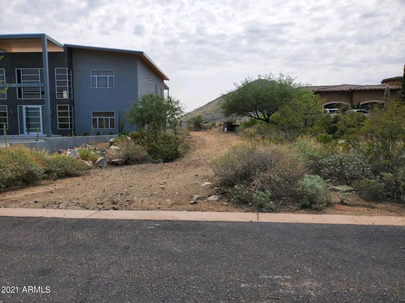 Private driveway entrance to main lot.