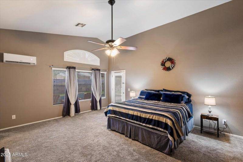 Primary Room with Exit to Backyard