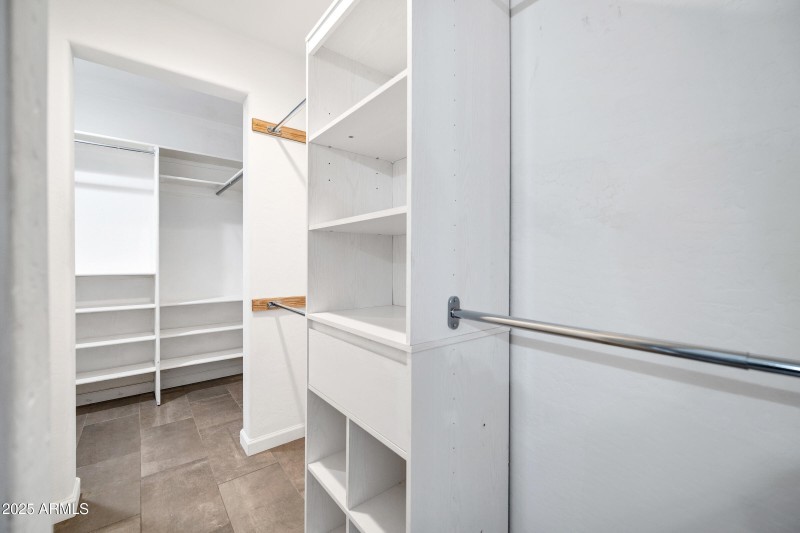 Walk-In Closet in Primary Bedroom