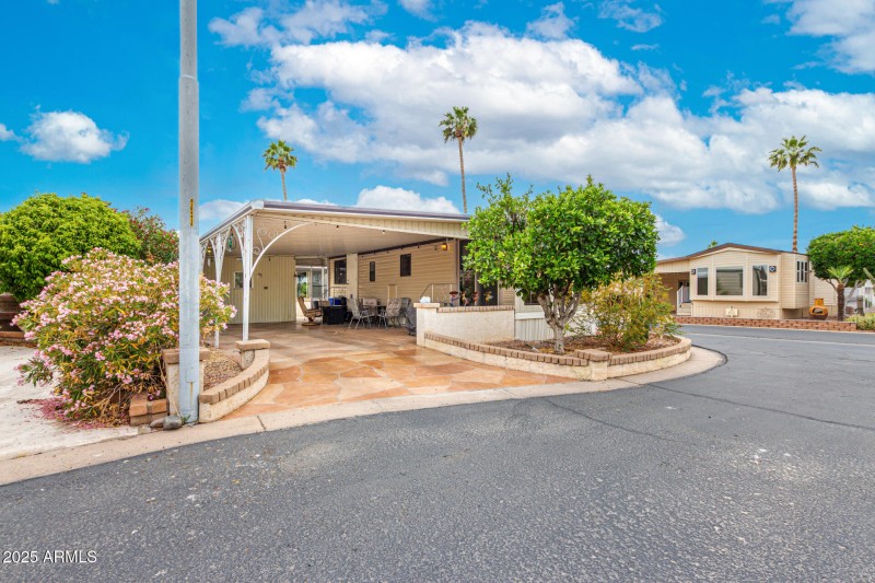 Front of Home - 4 Car-sized Carport
