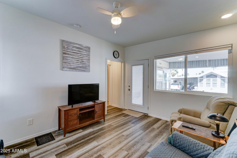 Inside the window blinds on front door