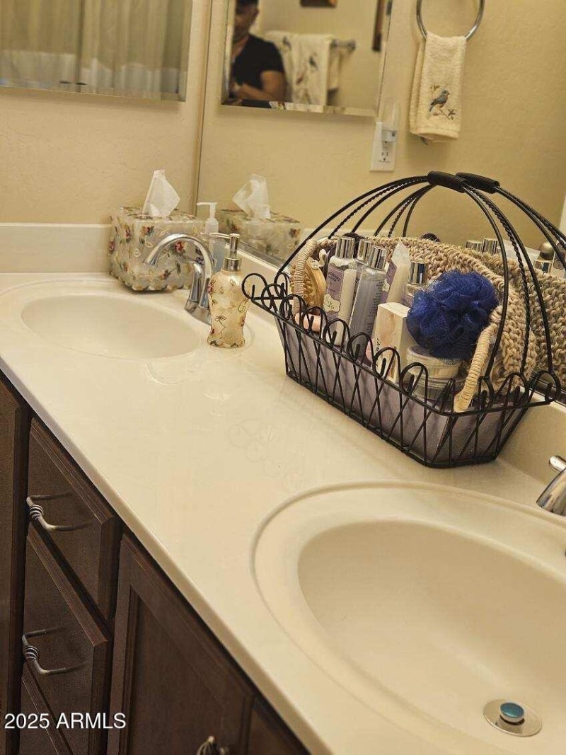 Double sinks in guest bath.