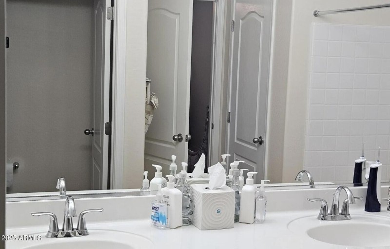 Dual sinks in both full bathrooms.