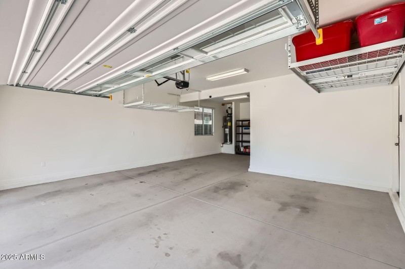 Garage with storage bay and shelving