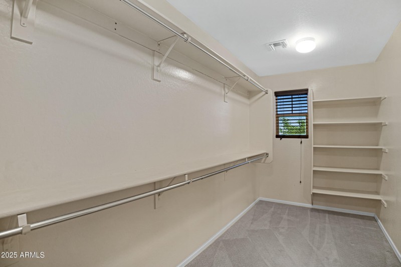 Large walk in primary bedroom closet