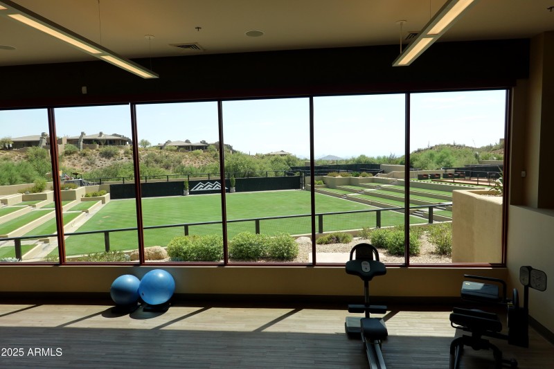 Sonoran Clubhouse view of grass court fr