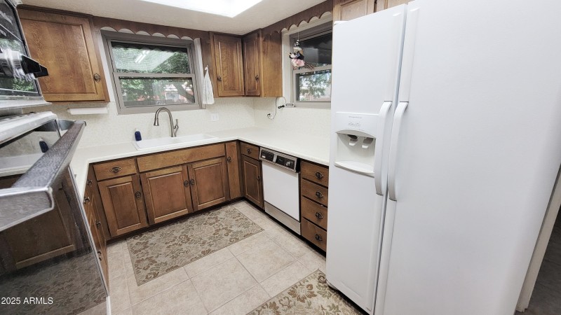 Two Windows to Back Yard