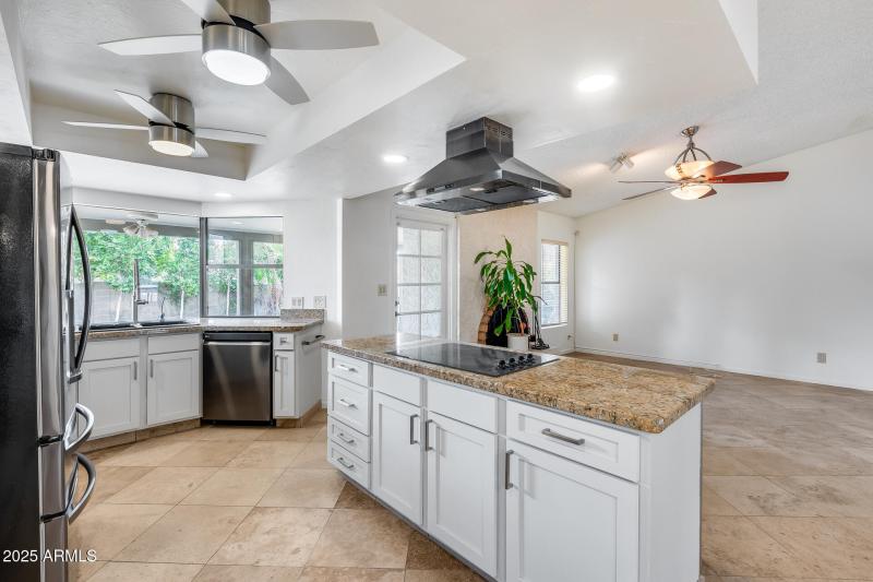 Kitchen view open to Family Room