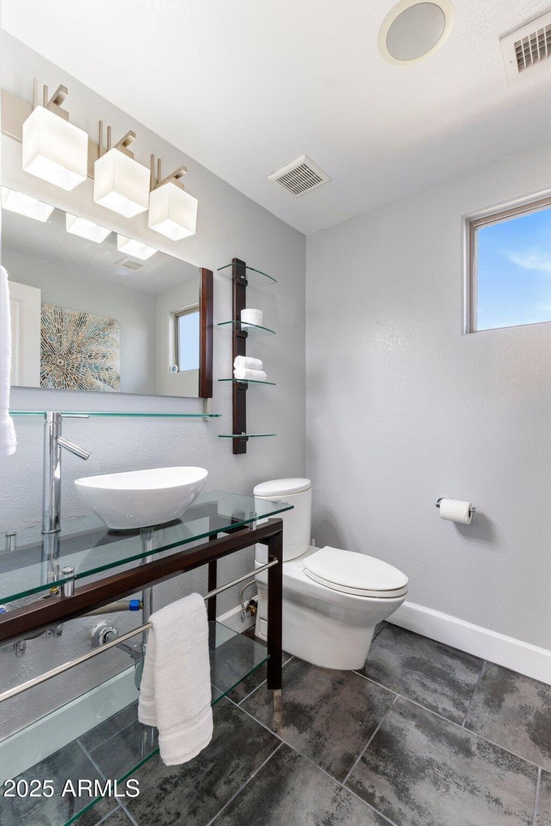 Chic Powder Room w Vessel Sink