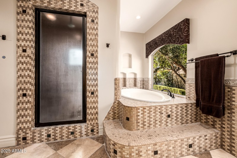 Walk in shower and separate soaking tub