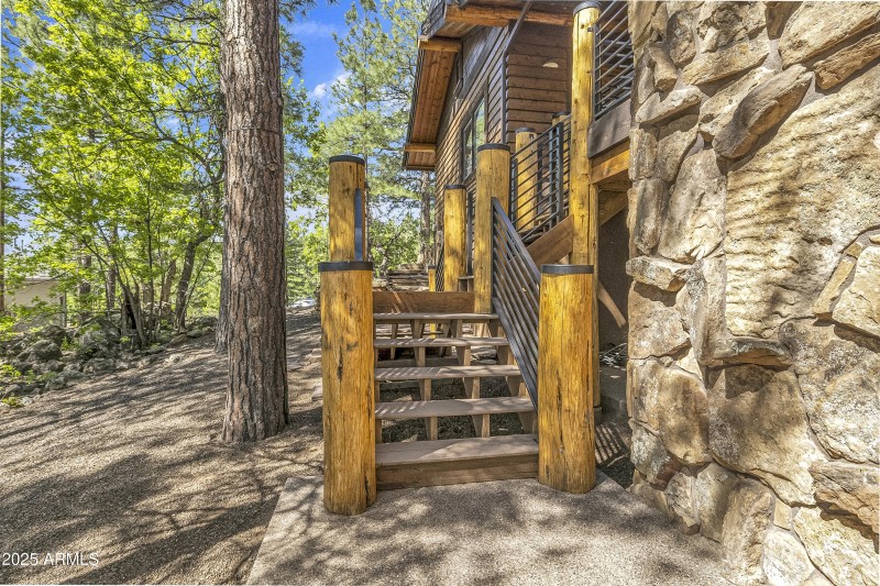 New deck beams, railing, and woodwork