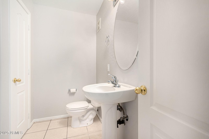 Downstairs Half Bath and Storage