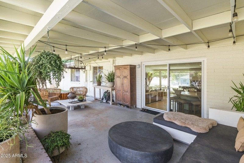 Large covered patio with lights
