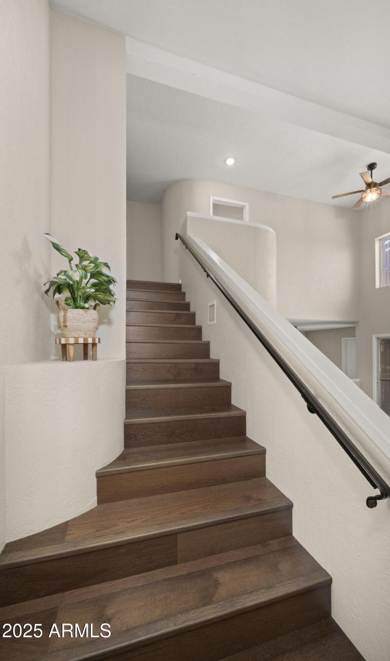 Staircase w/ New Flooring Upstairs