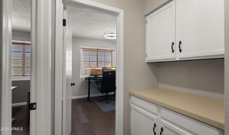 Hallway w/ Storage Cabinets