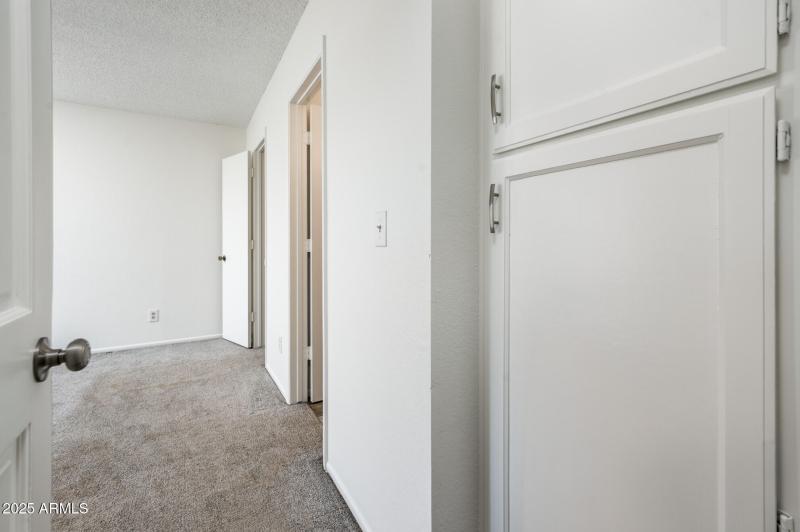 Linen Closet to Primary