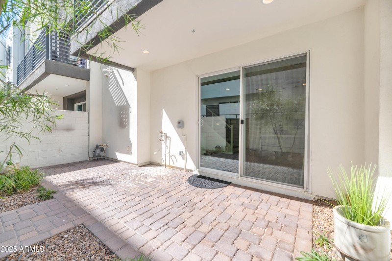 Private patio off of downstairs bedrooms