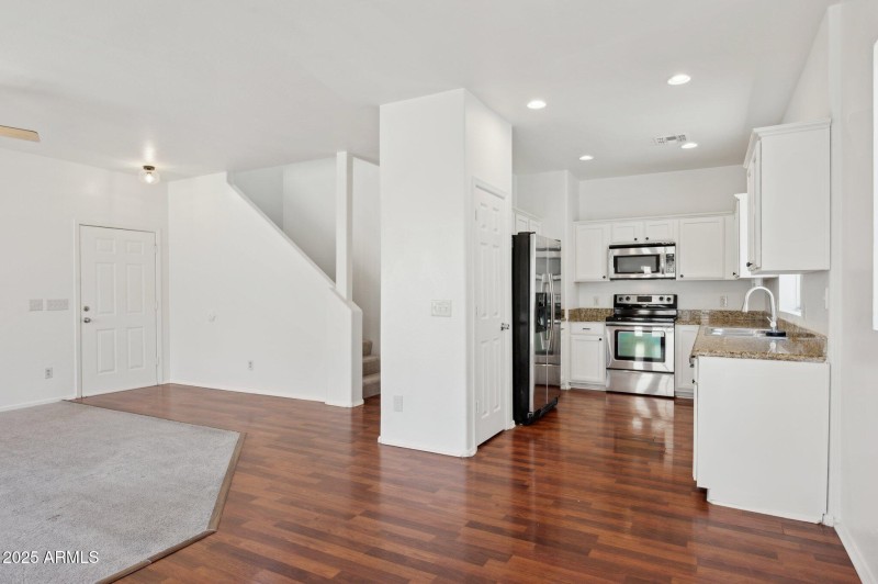 Front door and kitchen
