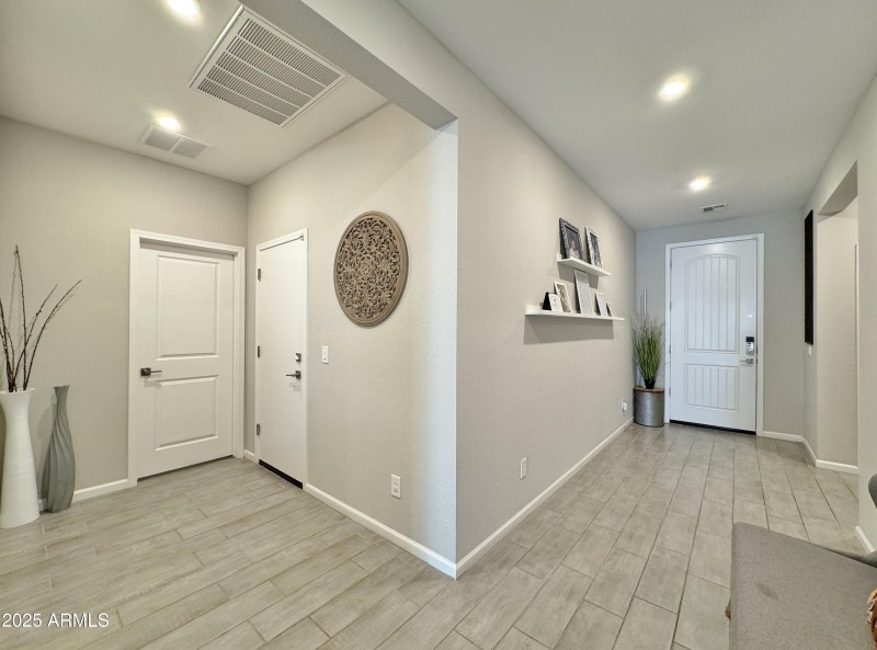 Entrance from garage & front