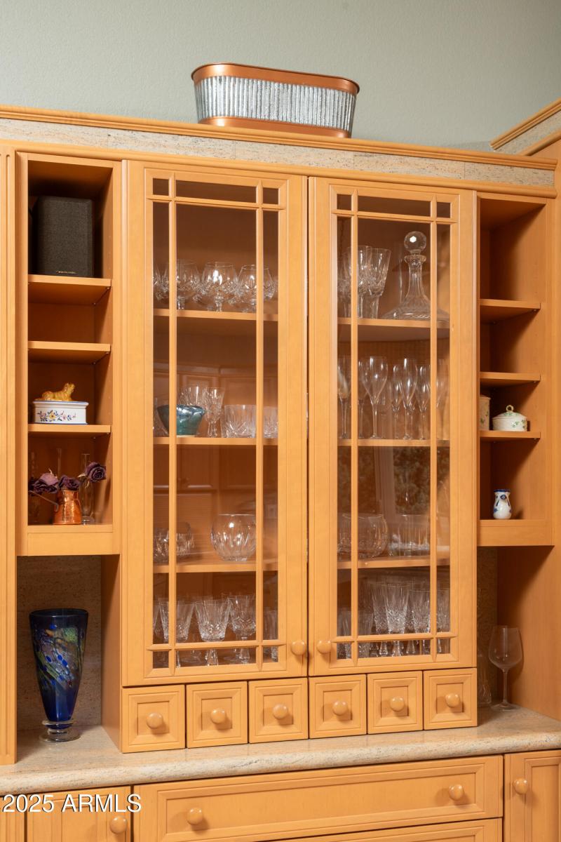 CUSTOM LIT BUILT-IN CABINETRY