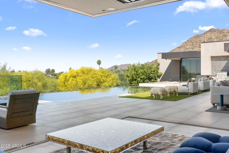 29-primary bedroom with sliders open