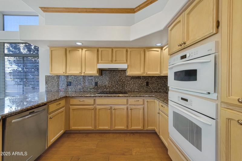 Abundant Cabinets and Granite