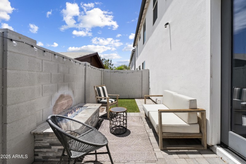 private patio with gas fireplace