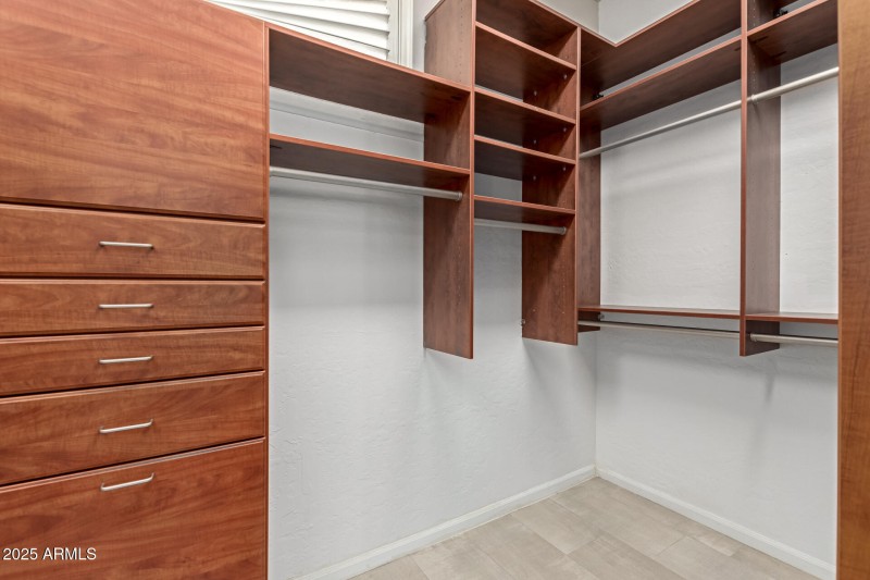 Primary Closet with Built-In Cabinetry