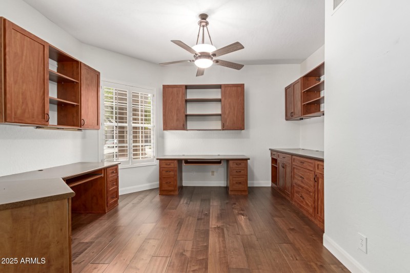 Den with Built-In Desks and Cabinetry