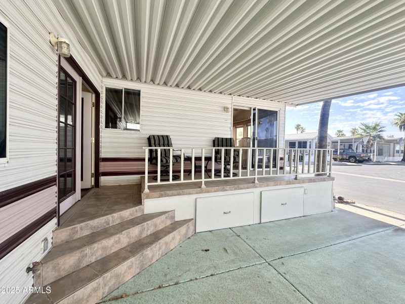 STEPS UP TO TILED DECK