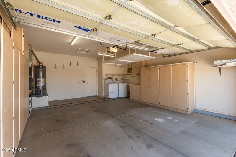 Garage with built in cabinets
