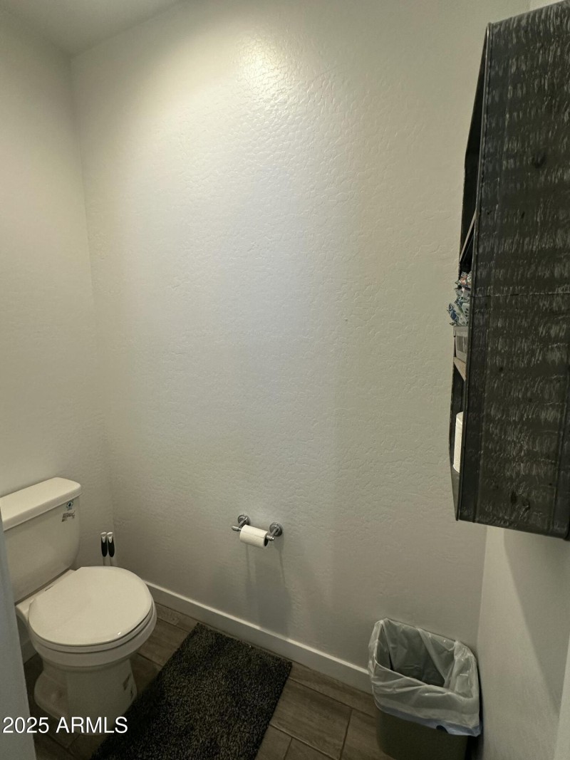 Primary bathroom toilet