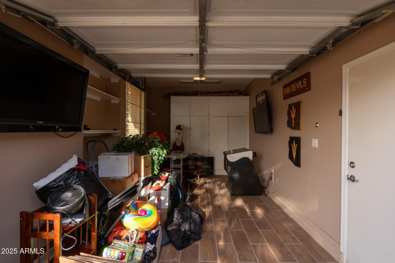 3rd car garage with tile floor