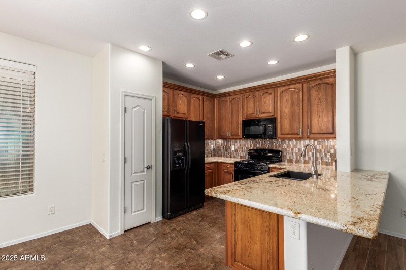 Nice Cabinets and Extended Granite Slab
