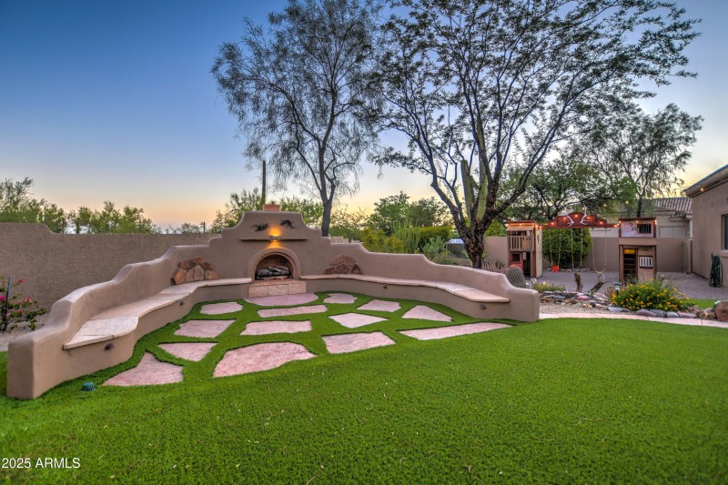 Outdoor fireplace gathering area