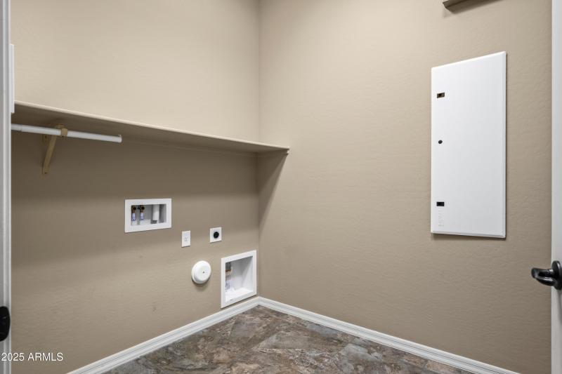 Laundry with cabinets & Sink