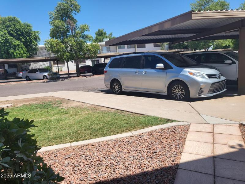 COVERED PARKING DIRECTLY BEHIND